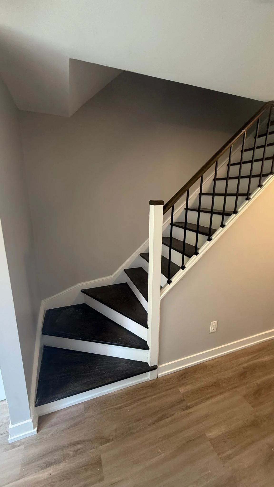 Renovated staircase and finished plank flooring